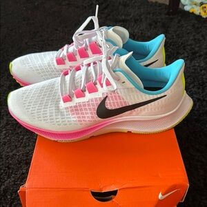 Nike White and Pink Athletic Shoes Lightweight Breathable Design